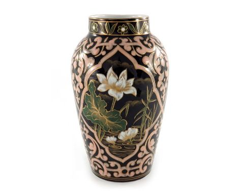 An Aesthetic Movement Limoges enamel or slip decorated vase, in the style of Zsolnay, shouldered form, three Persian ogee car