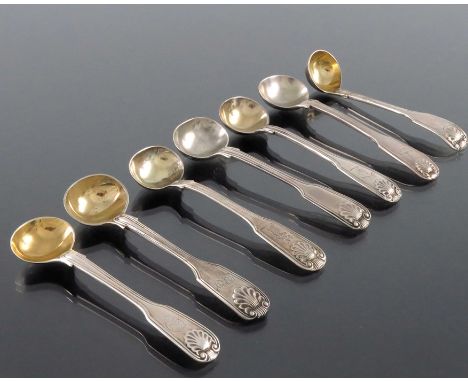 A set of seven George IV and later silver salt spoons, various makers and dates, Fiddle Thread and Shell pattern, some with s