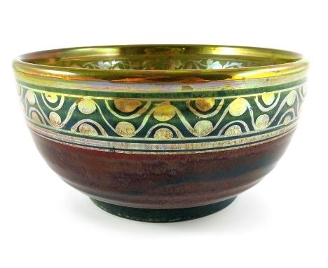 Charles Cundall for Pilkington, a Royal Lancastrian lustre bowl, 1909, the exterior with a sang de boeuf and turquoise glaze,