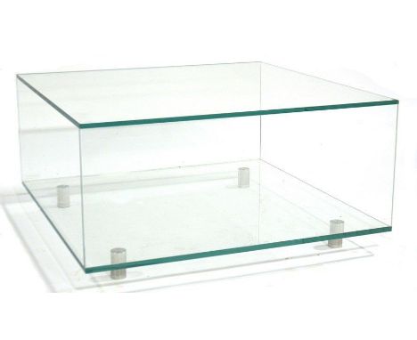 A contemporary Glassdomain glass coffee table, open cuboid form with low shelf, on four adjustable brushed aluminium cylindri