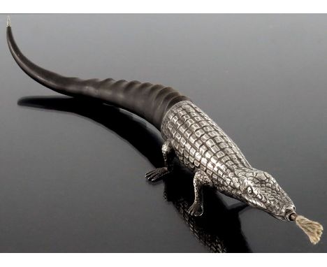 A Victorian silver novelty table lighter, William Graeme, London 1883, realistically modelled as a lizard, the body embossed 