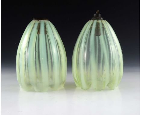 A pair of Arts and Crafts opal glass light shades, probably John Walsh Walsh, closed tulip form with inverted crimped rims, v