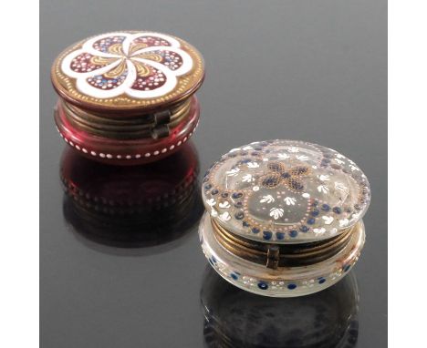 Two 19th century Bohemian enamelled glass boxes, circular form, floral and beaded border designs, one colourless, the other r