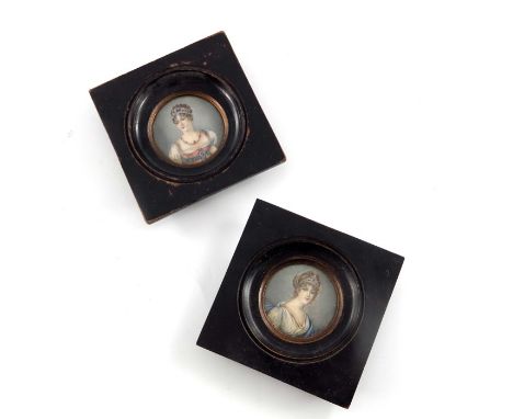 A pair of 19th century French portrait miniatures, of aristocratic women, signed, 5cm diameter, framed (2)