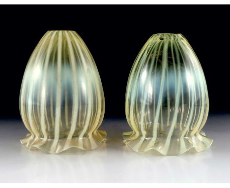 Harry Powell for James Powell and Sons, a pair of Arts and Crafts straw opal glass light shades, circa 1890, closed tulip for