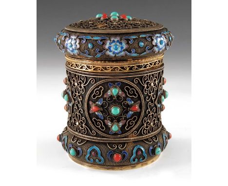 A Chinese silver gilt, filigree, enamelled and stone set tea caddy, cylindrical, mesh ground, overlaid with foliate scroll an