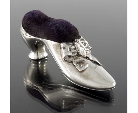 A Victorian silver novelty pin cushion, Birmingham 1890, in the form of a shoe, with ribbon bow, purple velvet fabric, 11cm l