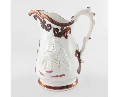 A Victorian relief moulded lustre commemorative jug for the Duke of Wellington, circa 1840, conical form with foliate scrolls