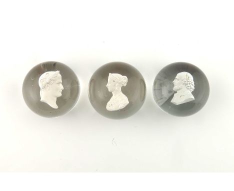 Clichy, three sulphide portrait paperweights, each with historical figures, clear ground, circa 1850, 6.5cm diameter (3)