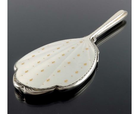 An Elizabeth II silver and enamelled hand mirror, Albert Carter, Birmingham 1958, feathered and lobed shield form, cream guil