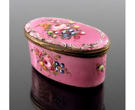 A George III Bilston enamelled patch or snuff box, oval pink with raised floral sprays and foliate scroll border, 6.5cm long