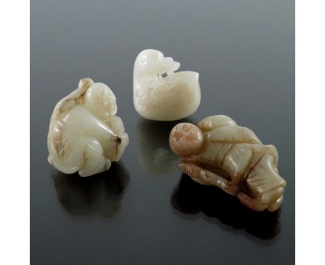 Three Chinese jade carvings, including man with a stick, man with monkey and a duck, pierced and engraved, 6.5cm (3)