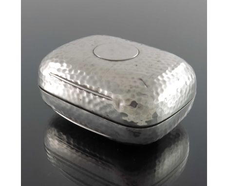 An Edwardian silver soap box, Goldsmiths and Silversmiths Company, London 1907, planished cuboid cushion form, with vacant ca