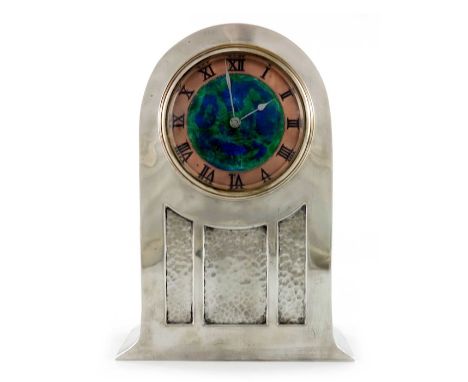 David Veasey for Liberty and Co., an Arts and Crafts Tudric pewter and enamelled dial mantle timepiece, circa 1900, domed wit