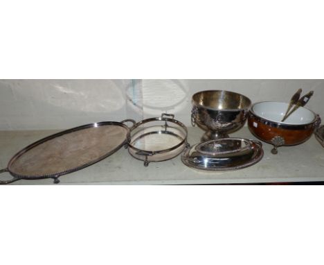A 1930's oak salad bowl with plated mounts and ceramic liner; a planished pedestal fruit bowl; an hors d'oeuvres dish; an ent