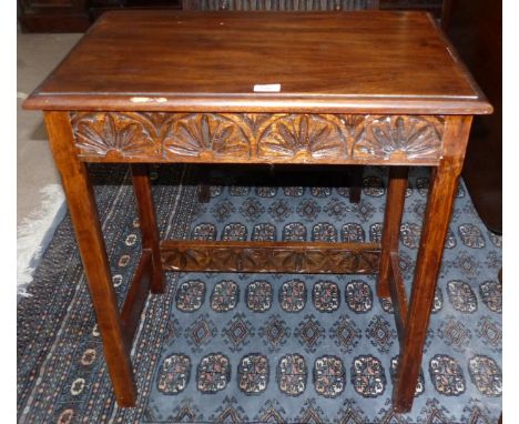 A 1920's oak table with carved frieze; and another
