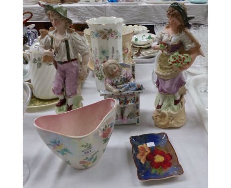 A pair of continental porcelain coloured bisque figures, 13"; a child in a chair biscuit box; a Royal Doulton dish, and a Mal