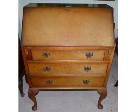 A 1930's burr walnut bureau