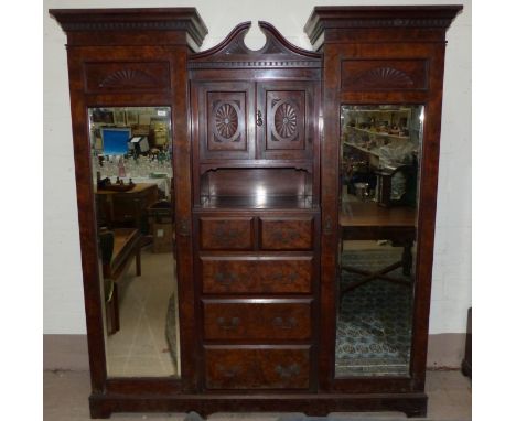 A Victorian burr walnut 3 piece bedroom suite comprising combination triple wardrobe with twin mirror door robes, and central