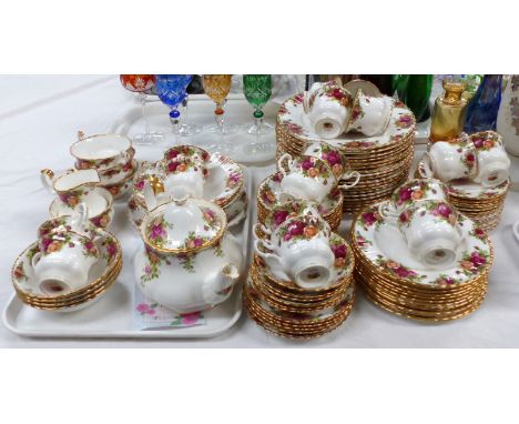 A Royal Albert Old Country Roses dinner and tea service including 3 sizes of plates; soup bowls; teapot; cups; saucers; etc. 