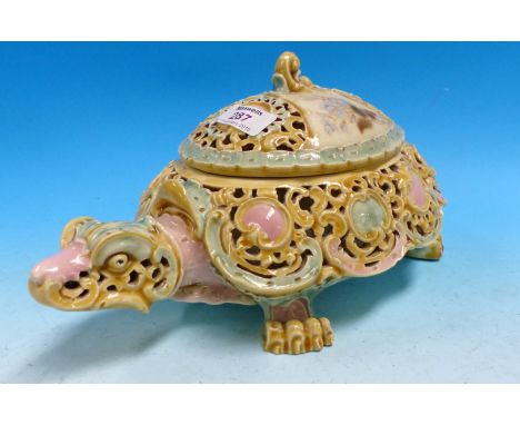 A reticulated covered bowl in the form of a turtle, by Zsolnay Pécs, length 12" (minor chips)