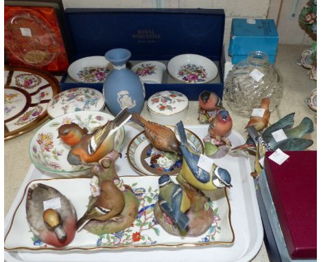 A selection of Royal Worcester china birds; miniature china
