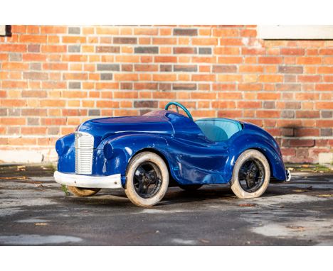 An Austin J40 pedal car, chassis number 27577, mid 1960s,suitable for restoration, finished in dark blue, light blue padded l