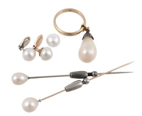 A natural baroque pearl drop, the natural baroque pearl with a rose cut diamond set surmount, on a polished band, stamped 18K