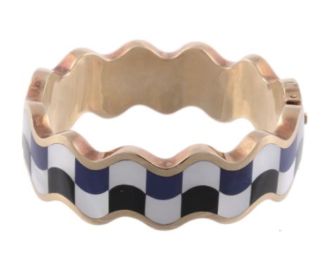 A mother of pearl, onyx and lapis lazuli hinged bangle by Angela Cummings...  A mother of pearl, onyx and lapis lazuli hinged