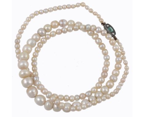 A single row of pearls, the one hundred and thirty seven graduated pearls...  A single row of pearls,   the one hundred and t