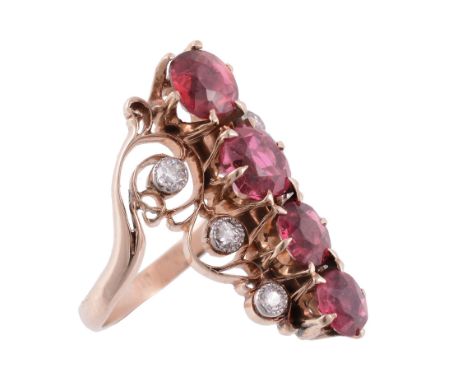 A spinel and diamond ring, circa 1900, set with a central row of circular...  A spinel and diamond ring,   circa 1900, set wi