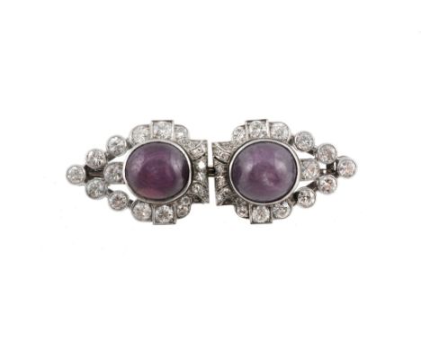 A star ruby and diamond double clip brooch, circa 1950  A star ruby and diamond double clip brooch,   circa 1950, the pear sh