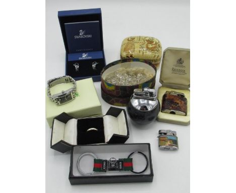 A pair of Swarovski earrings complete with box and certificate, 20th C Indo Persian lidded box, a boxed Ronson Varaflame ligh