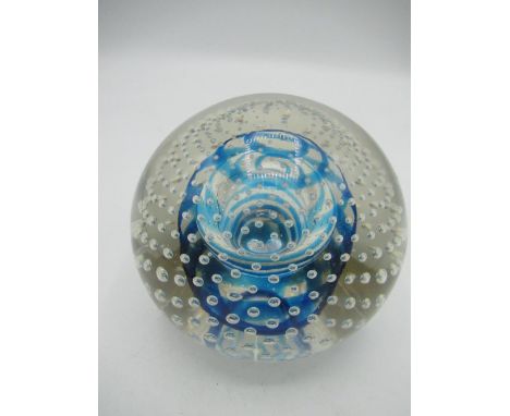 Very large Caithness style paperweight with blue center surrounded by bubbles 