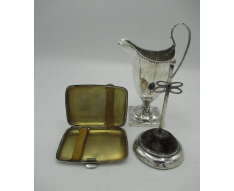 Geo.111 silver hallmarked helmet shaped cream jug, London 1788, an Edw.V11 hat pin stand, Birmingham 1905 and a Geo.V cigaret