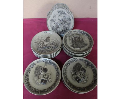Poole Pottery Christmas decorative plates 1979 - 1984, set of four seasonal decorative plates, and seven others 