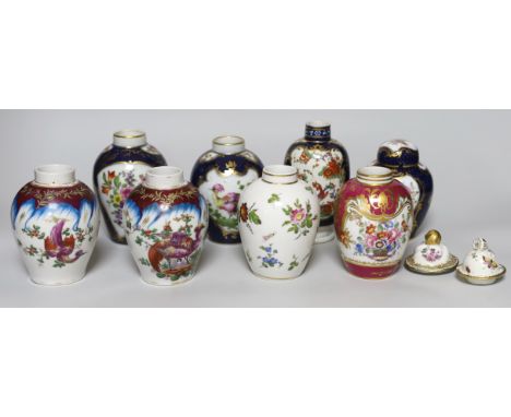 A group of Paris porcelain tea canisters in imitation of Worcester and Sevres, tallest 13.5cm, together with a Worcester Kaki