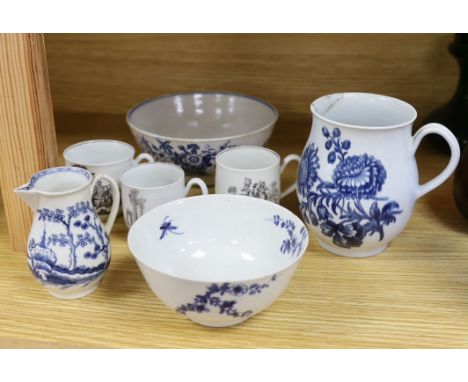 18th century Worcester comprising two floral bowls, two jugs, and three transfer printed cups, the largest 15cm in diameter (
