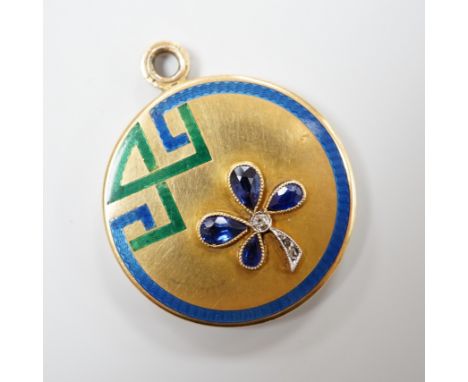 An Art Deco yellow metal, three colour enamel, synthetic? sapphire and diamond set circular locket, with clover motif, diamet