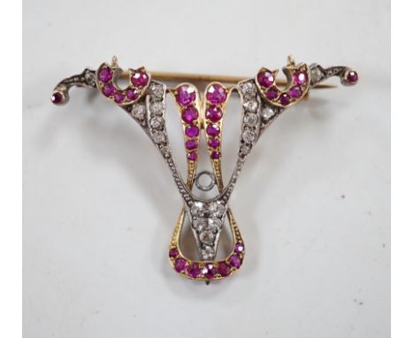 An early 20th century yellow metal, ruby and diamond cluster set brooch (stone missing), width 41mm, gross weight 4.8 grams.