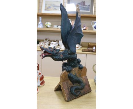 A Chinese green painted terracotta ridge tile in the form of a dragon, 80cm high (af)