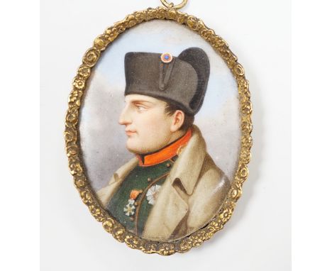 A 19th century gilt framed portrait miniature of Napoleon, on porcelain, with box
