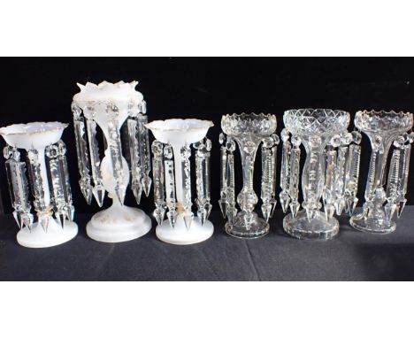 TWO PAIRS OF GLASS LUSTRES, AND TWO SINGLE LUSTRESone pair cut, of trumpet form 25cm high, and one similar cut larger, the ot