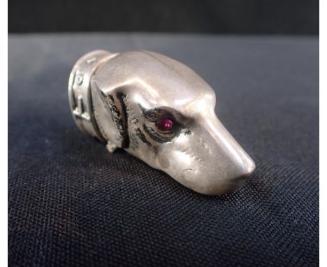 DOG'S HEAD SNUFF HOLDERwith ruby eyes, continental 975 mark