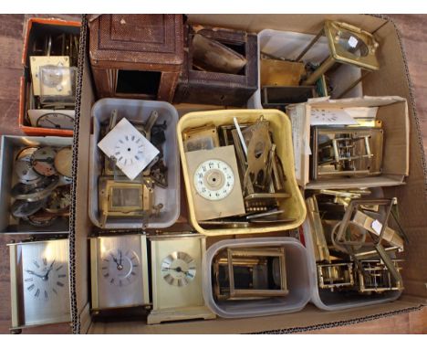 A QUANTITY OF CARRIAGE CLOCK PARTSdials, pillars etc, a few modern carriage clocks, and travel clock parts etc
