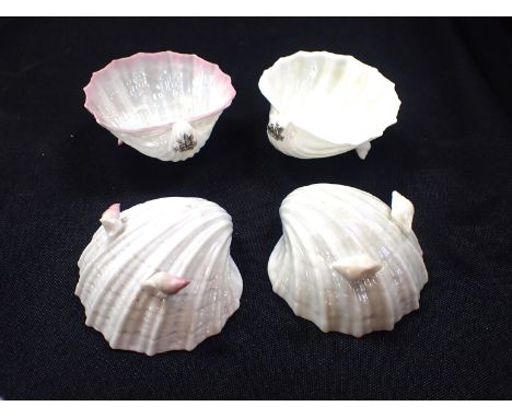TWO PAIRS OF BELLEEK FIRST PERIOD PORCELAIN SHELL SALTSone damaged (4)