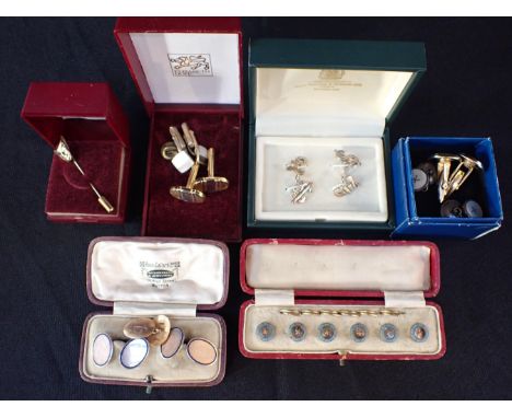 A PAIR OF 9CT GOLD CUFFLINKSone single 9ct gold cufflink (c.14.05g all in) ; a set of six dress studs; and various other cuff