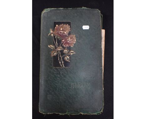 A POSTCARD ALBUMcontaining British topographical, greetings, theatre, family cards etc, mostly early 20th century