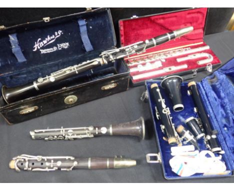 TWO HAWKES & Co CLARINETSin a Hawkes case, a Buffet, Crampon et Cie clarinet, and a Jupiter flute (4)