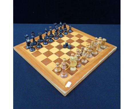 A STAUNTON CHESS SETand veneered board